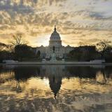 US Capitol Building with sunrise sky