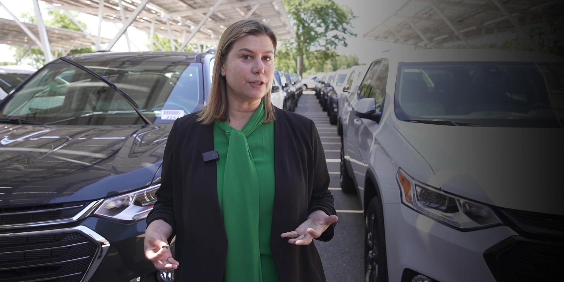 Congresswoman Slotkin discusses the microchip shortage surrounded by thousands of unfinished cars.