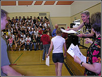 Valley View Middle School Principal Nancy Rhoades passes out SERT certificates during the 17 June 2004 Awards Assembly.  Photo by Snohomish County OEM CERT Manager Christine Colmore
