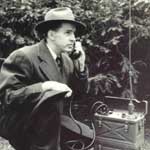 Photograph of 1940's special agent using radio.