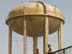An unusable water tower that was damaged during the war in Nasiriyah.  Distribution of potable water remains a big problem for the citizens, as existing water lines are often contaminated because of a high water table and the presence of open sewage.