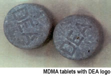 photo - MDMA tablets with DEA logo
