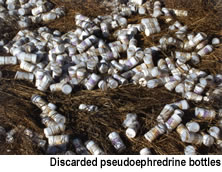 photo - discarded pseudoephredrine bottles