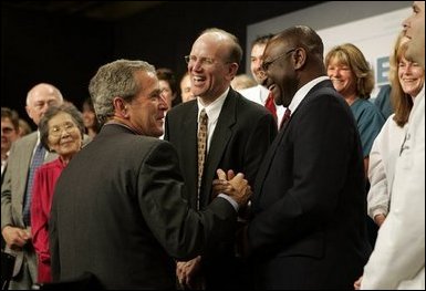 President George W. Bush greets the audience after participating in a conversation on health care and community health centers at Youngstown State University in Youngstown, Ohio, Tuesday May 25, 2004. White House photo by Paul Morse.