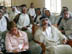 Mokhtars from Abu Ghrayek, 1 of 15 subdistricts of the Babel Governate, listen to a description of the basics of democracy and the selection process that will allow for delegates to select 20 members from their communities to a new district council. USAID is working to promote ongoing  local governence projects throughout Iraq.