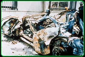 Photograph of damaged vehicles located near the U.S. Embassy