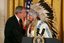President George W. Bush greets Sen. Benjamin Nighthorse Campbell, R-Colo., during a ceremony marking the opening of the National Museum of the American Indian in the East Room Thursday, Sept. 23, 2004. White House photo by Paul Morse.