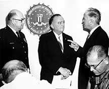 This is a photograph of J. Edgar Hoover with local officials at the 1964 reopening of the Jackson FBI Office.