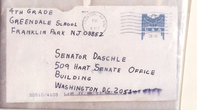This is an envelope addressed to Senator Daschle, 409 Hart Senate Office Building, Washington D.C. 205 FROM: 4th Grade, Greendale School, Franklin Park, NJ 08852