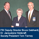 Photograph of Dr. Jacquelyne Holdcraft, Bruce Gebhardt, and Tom Tierney