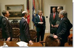 President George W. Bush meets with economists in the Roosevelt Room Friday, Jan. 30, 2004. White House photo by Tina Hager.