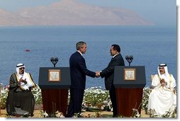President George W. Bush and President Hosni Mubarak of Egypt after delivering statements on the progress of the Red Sea Summit in Sharm El Sheikh, Egypt June 3, 2003. On the far left sits Prince Abdullah Bin Abd Al Aziz of Saudi Arabia and on the far right sits King Hamad Bin Issa Al Khalifa of Bahrain. White House photo by Paul Morse.