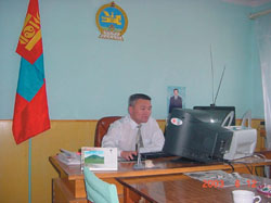Chief Judge of the Dornod Aimag court at his office working on this computer through a local area network