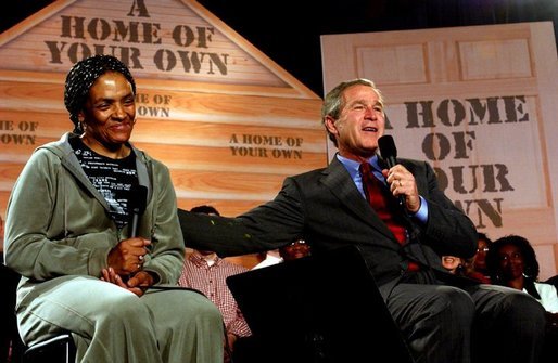 President George W. Bush speaks during a discussion about homeownership with first-time homebuyer Pearl Cerdan in Ardmore, Pennsylvania. Monday, March 15, 2004. White House photo by Tina Hager.