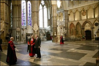  Walking with Dr. Wesley Clark, President George W. Bush tours Westminster Abbey Thursday, Nov. 20, 2003. Mrs. Bush is also pictured. White House photo by Eric Draper