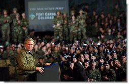President George W. Bush delivers remarks to U.S. soldiers and families at Fort Carson, Colorado Nov. 24, 2003 White House photo by Tina Hager.