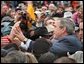 President George W. Bush greets the crowd after speaking at the New Mexico Welcome at Riner Steinhoff Soccer Complex in Alamogordo, N.M., Oct. 28. White House photo by Eric Draper.
